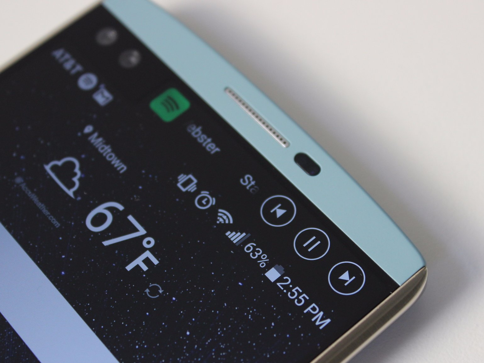 LG V10 with the Second Screen showing Spotify info and controls.